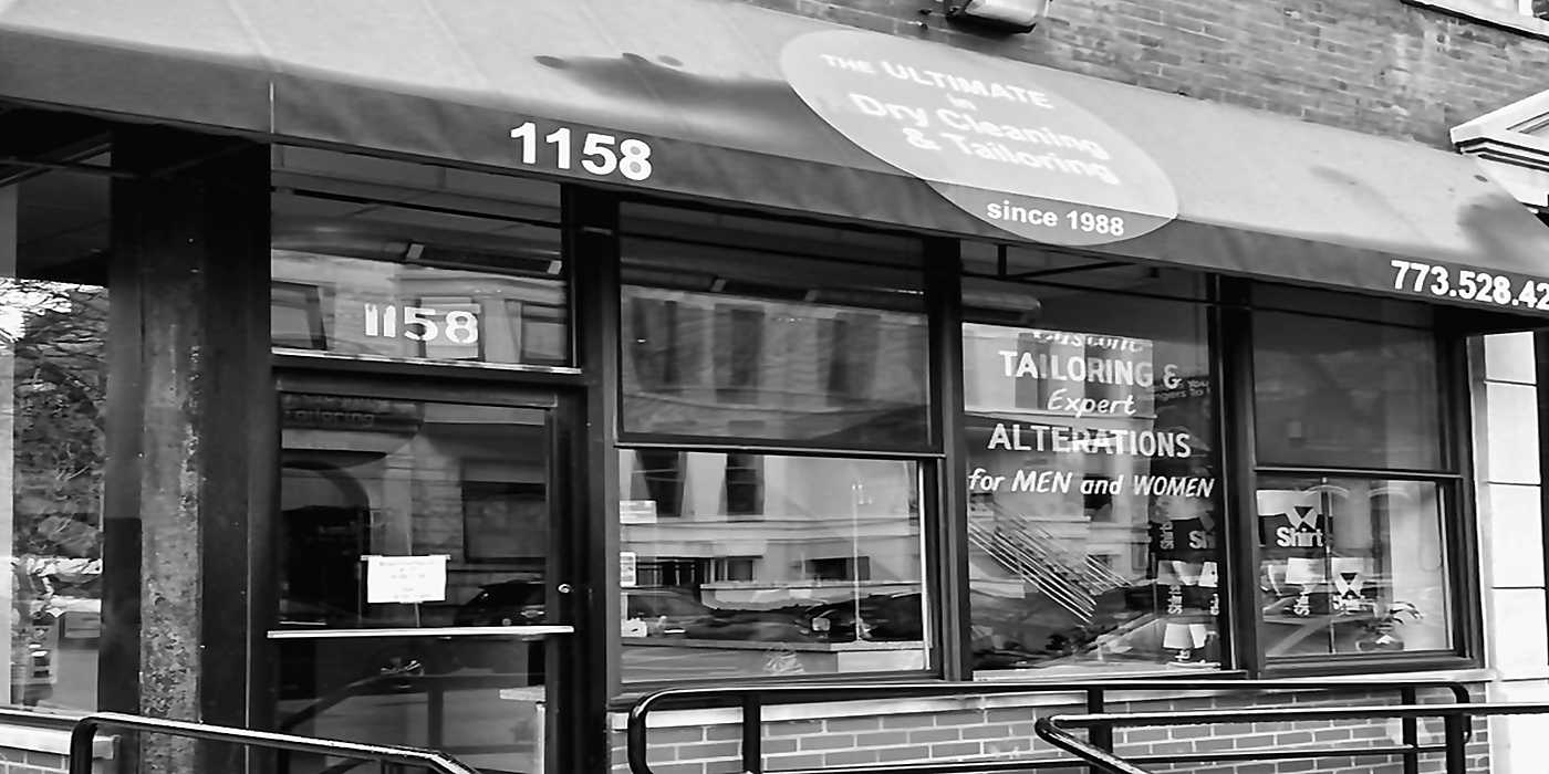 Black-and-white storefront image prepared for the Services page image band.